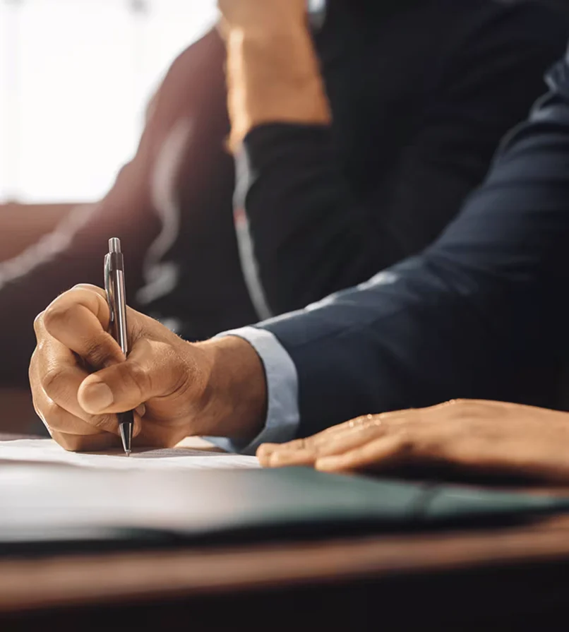 Lawyer writes on paper