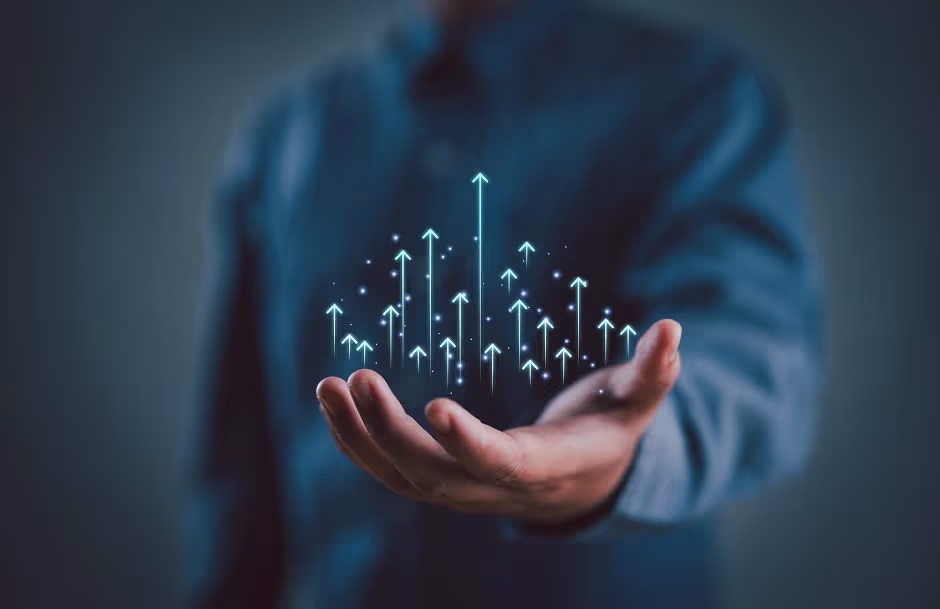 Open hand holding glowing upward arrows, suggesting improvement and growth