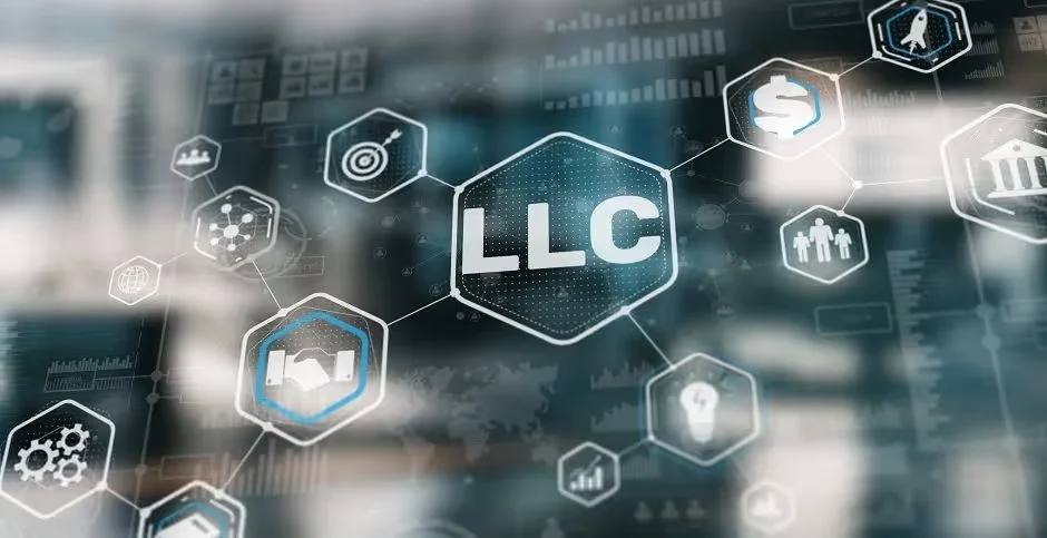 "LLC" in a hexagon surrounded by digital business icons
